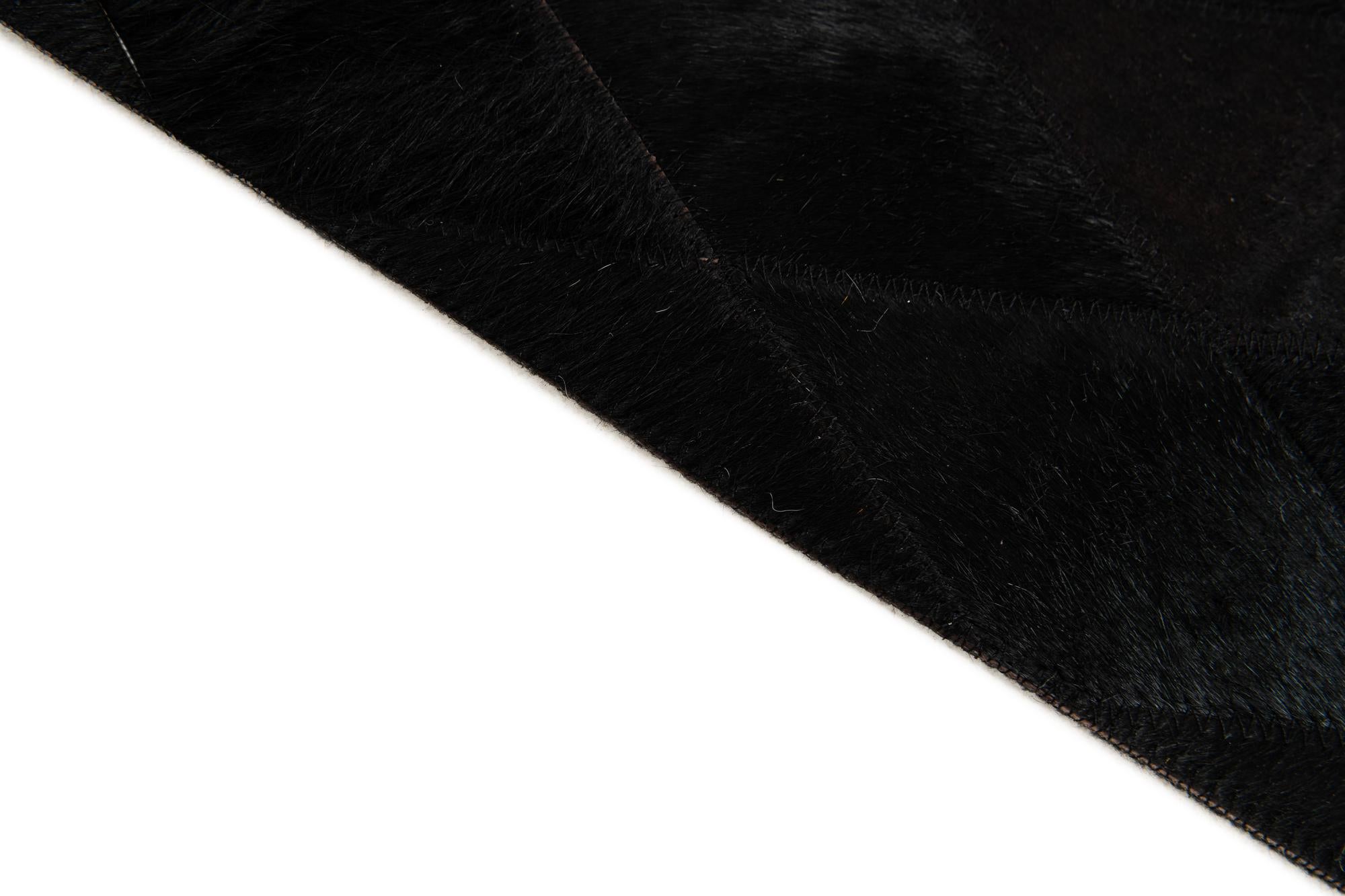 5' 1 x 8' Cowhide Stocks Rug