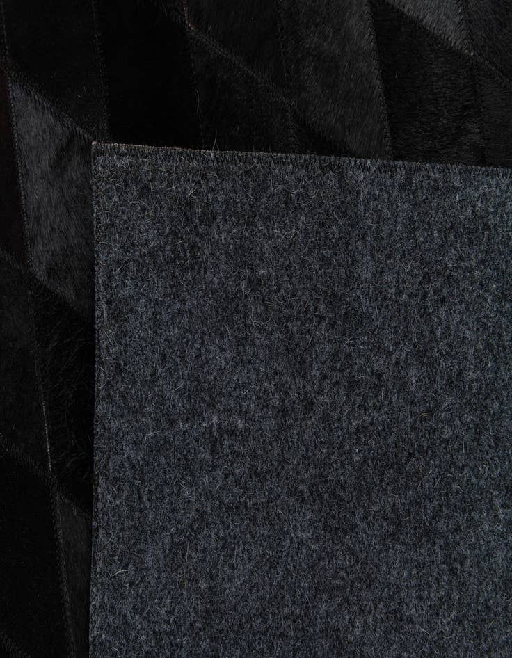 Detail image of 5' 1 x 8' Cowhide Stocks Rug