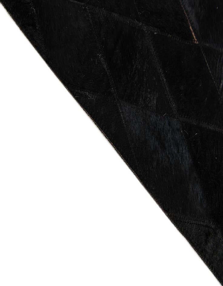 Detail image of 5' 2 x 8' Cowhide Stocks Rug