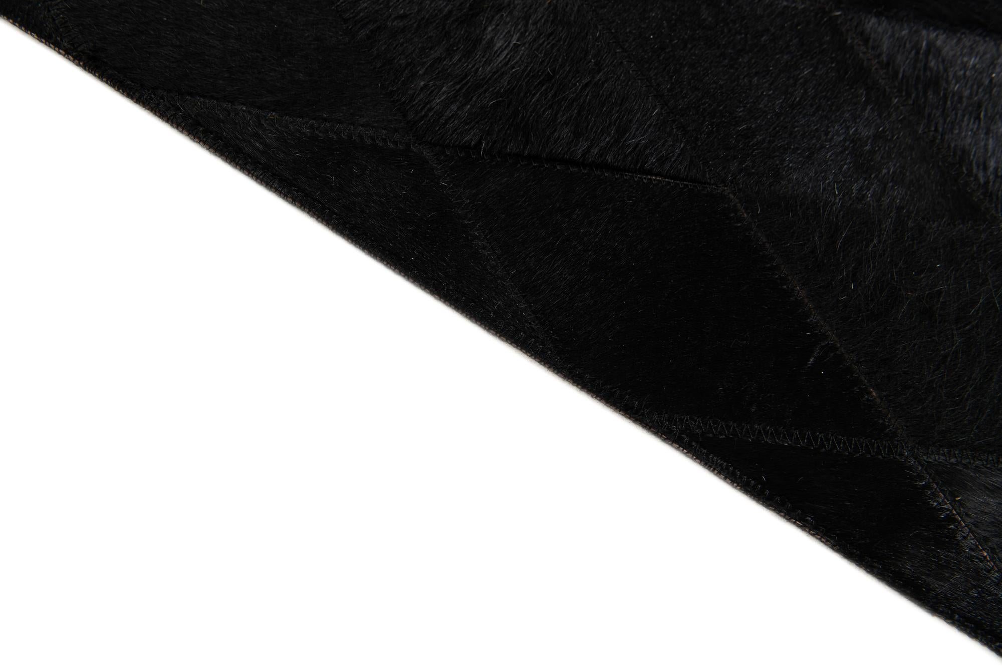 5' 2 x 8' Cowhide Stocks Rug