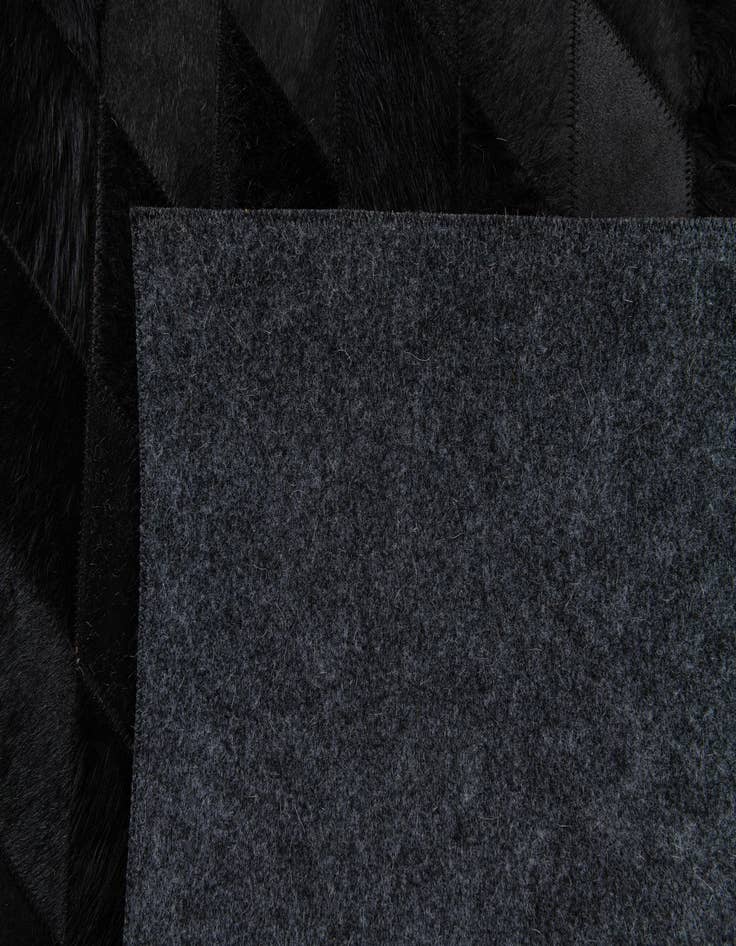 Detail image of 5' 2 x 8' Cowhide Stocks Rug