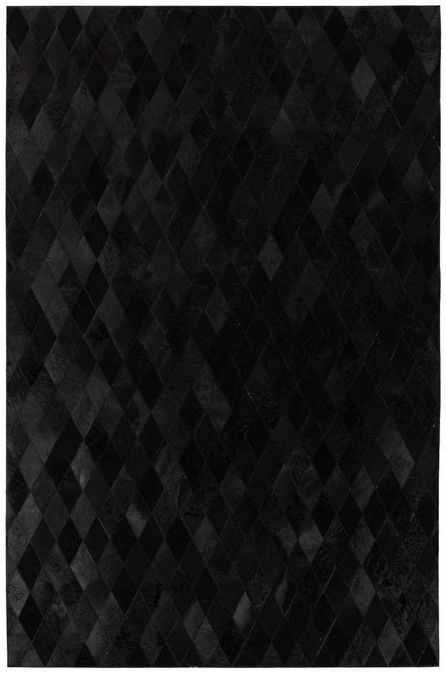 Detail image of 5' 2 x 8' Cowhide Stocks Rug