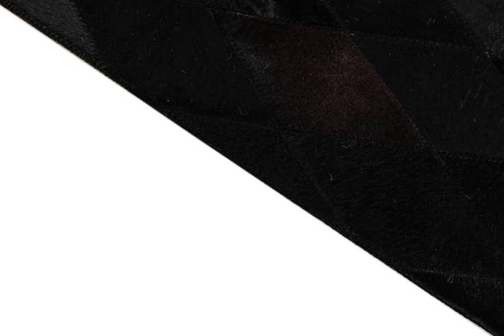 Detail image of 5' 2 x 8' Cowhide Stocks Rug