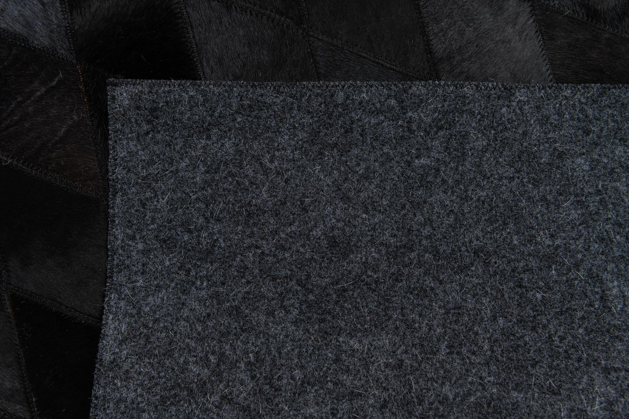 5' 2 x 8' Cowhide Stocks Rug
