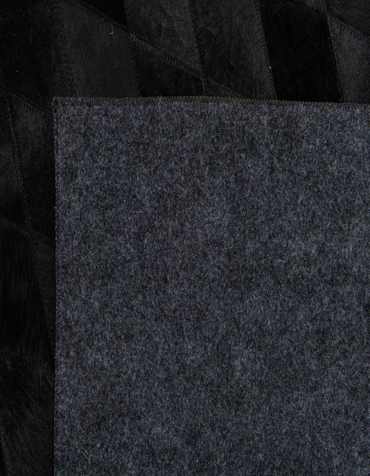 Detail image of 5' 1 x 7' 11 Cowhide Stocks Rug