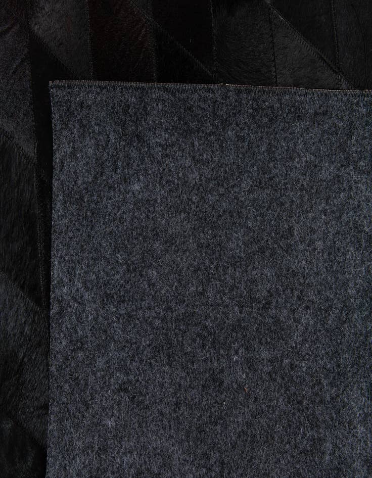 Detail image of 5' 2 x 8' Cowhide Stocks Rug