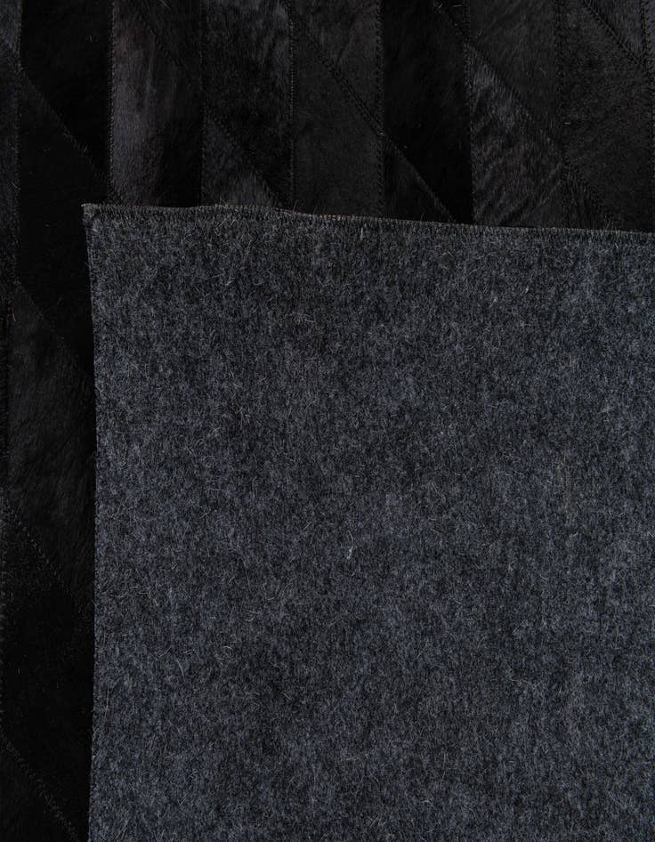 Detail image of 5' 2 x 7' 11 Cowhide Stocks Rug