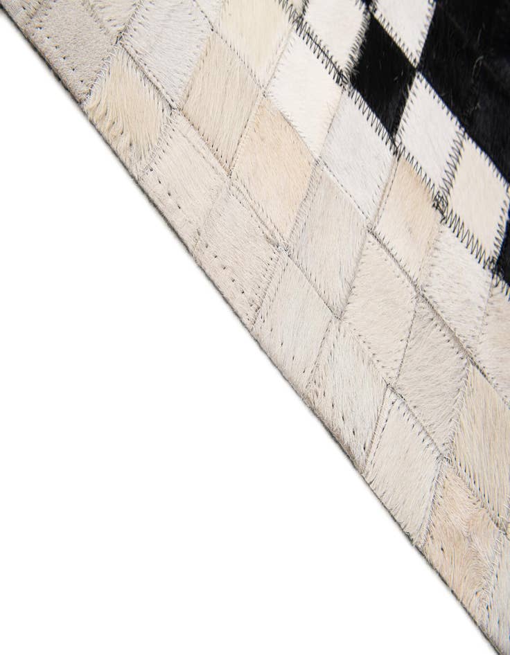 Detail image of 5' 2 x 7' 11 Cowhide Stocks Rug