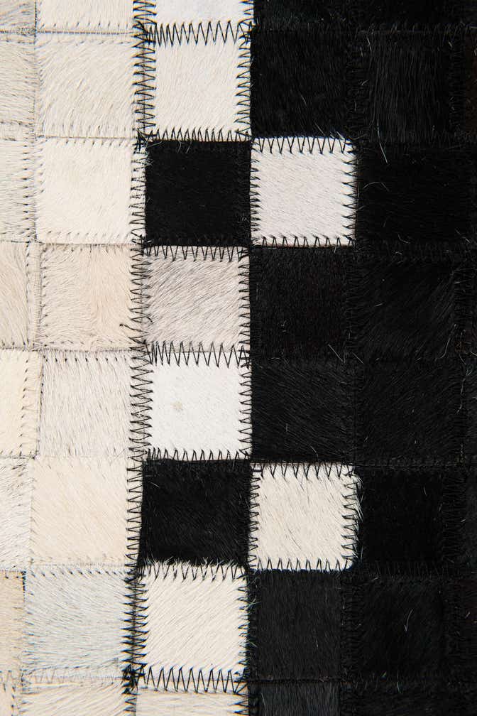 5' 2 x 7' 11 Cowhide Stocks Rug