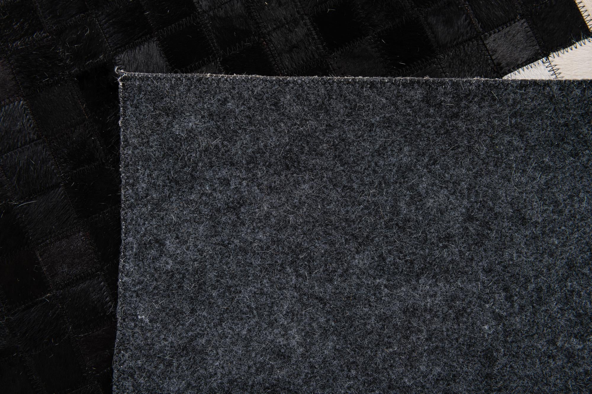 5' 2 x 7' 11 Cowhide Stocks Rug