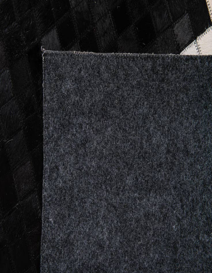 Detail image of 5' 2 x 7' 11 Cowhide Stocks Rug