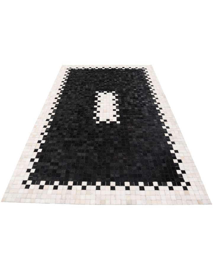 5' 2 x 8' 1 Cowhide Stocks Rug