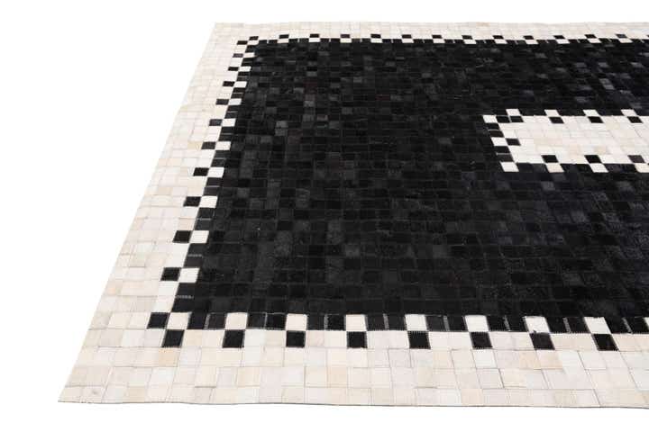 5' 2 x 8' 1 Cowhide Stocks Rug