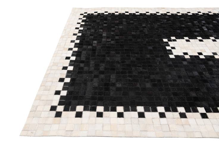 Detail image of 5' 2 x 8' 1 Cowhide Stocks Rug
