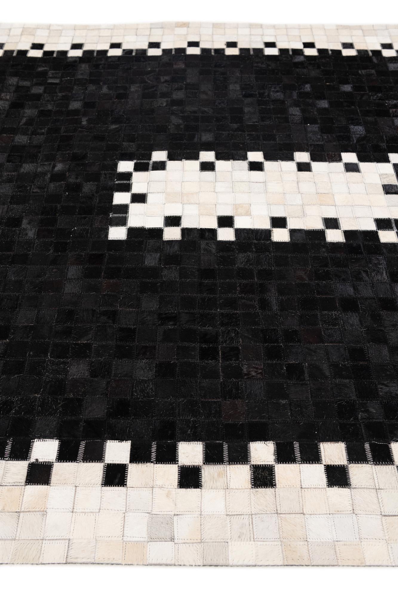 5' 2 x 8' 1 Cowhide Stocks Rug
