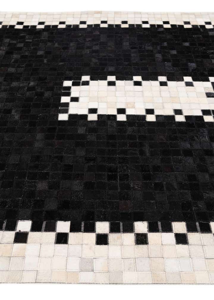 5' 2 x 8' 1 Cowhide Stocks Rug