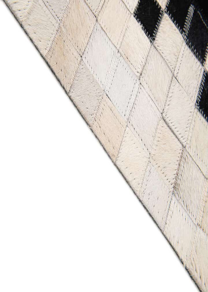 5' 2 x 8' 1 Cowhide Stocks Rug
