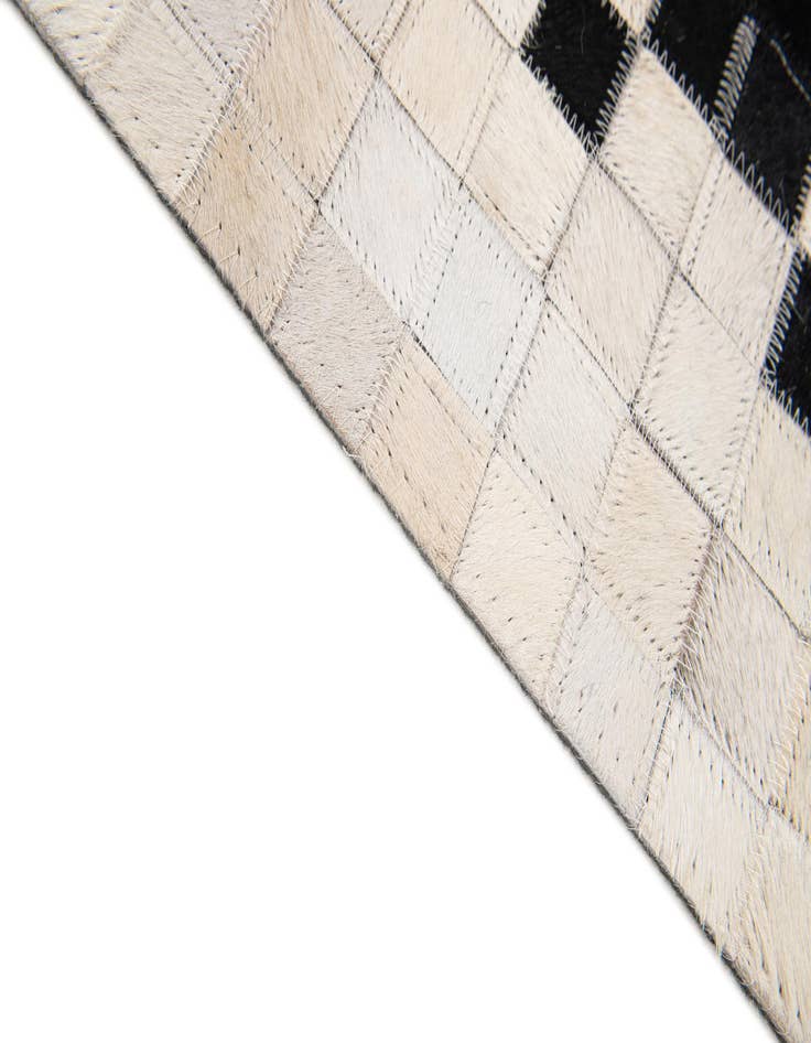 Detail image of 5' 2 x 8' 1 Cowhide Stocks Rug