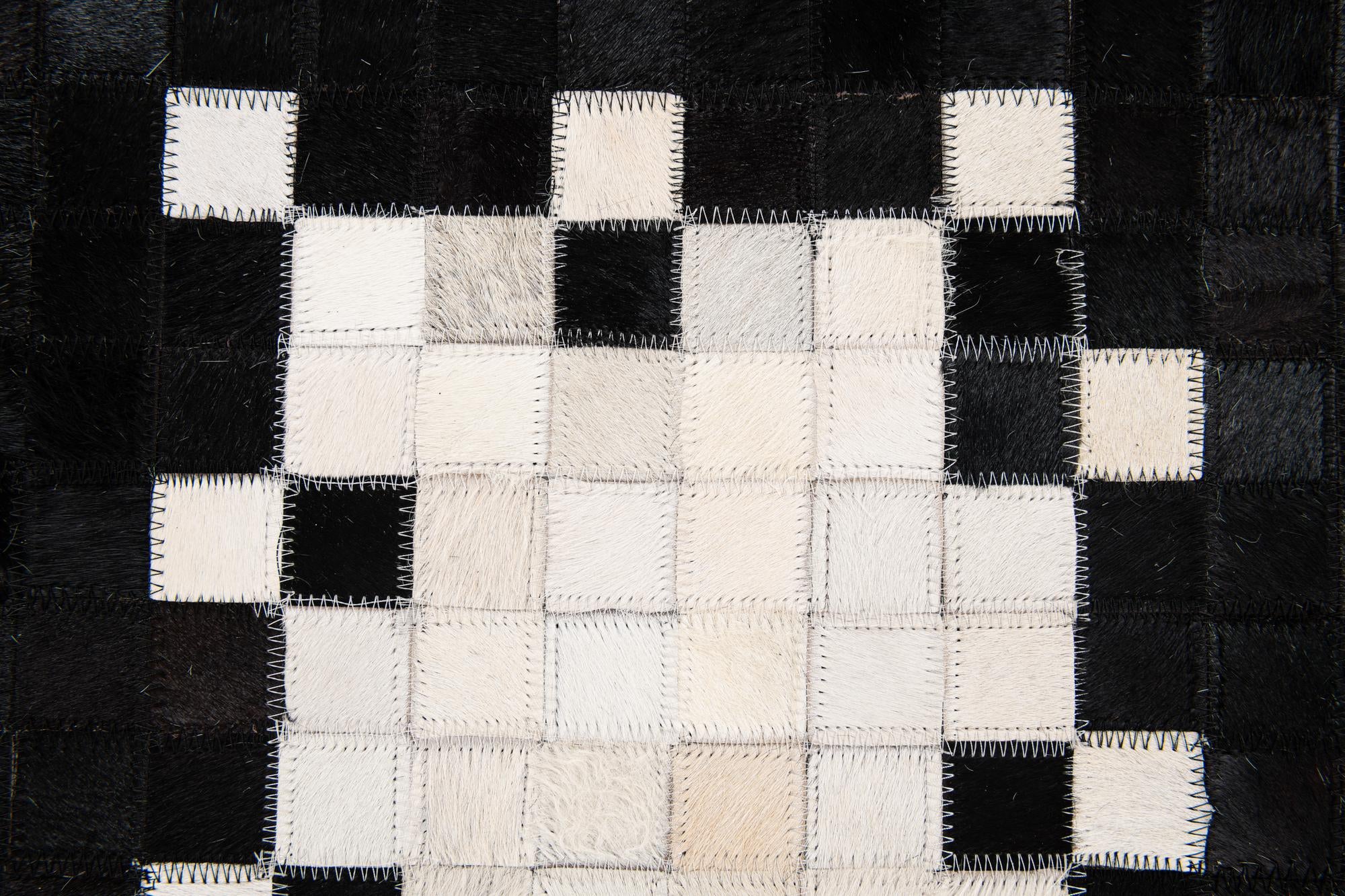 5' 2 x 8' 1 Cowhide Stocks Rug