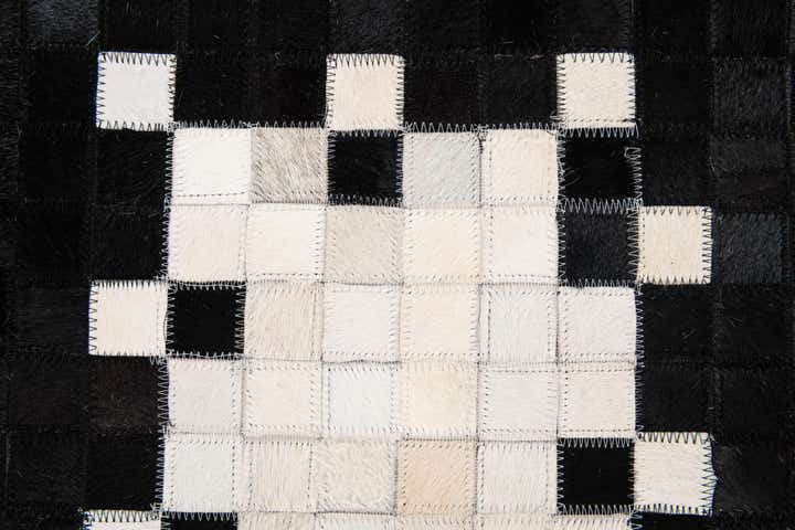 5' 2 x 8' 1 Cowhide Stocks Rug
