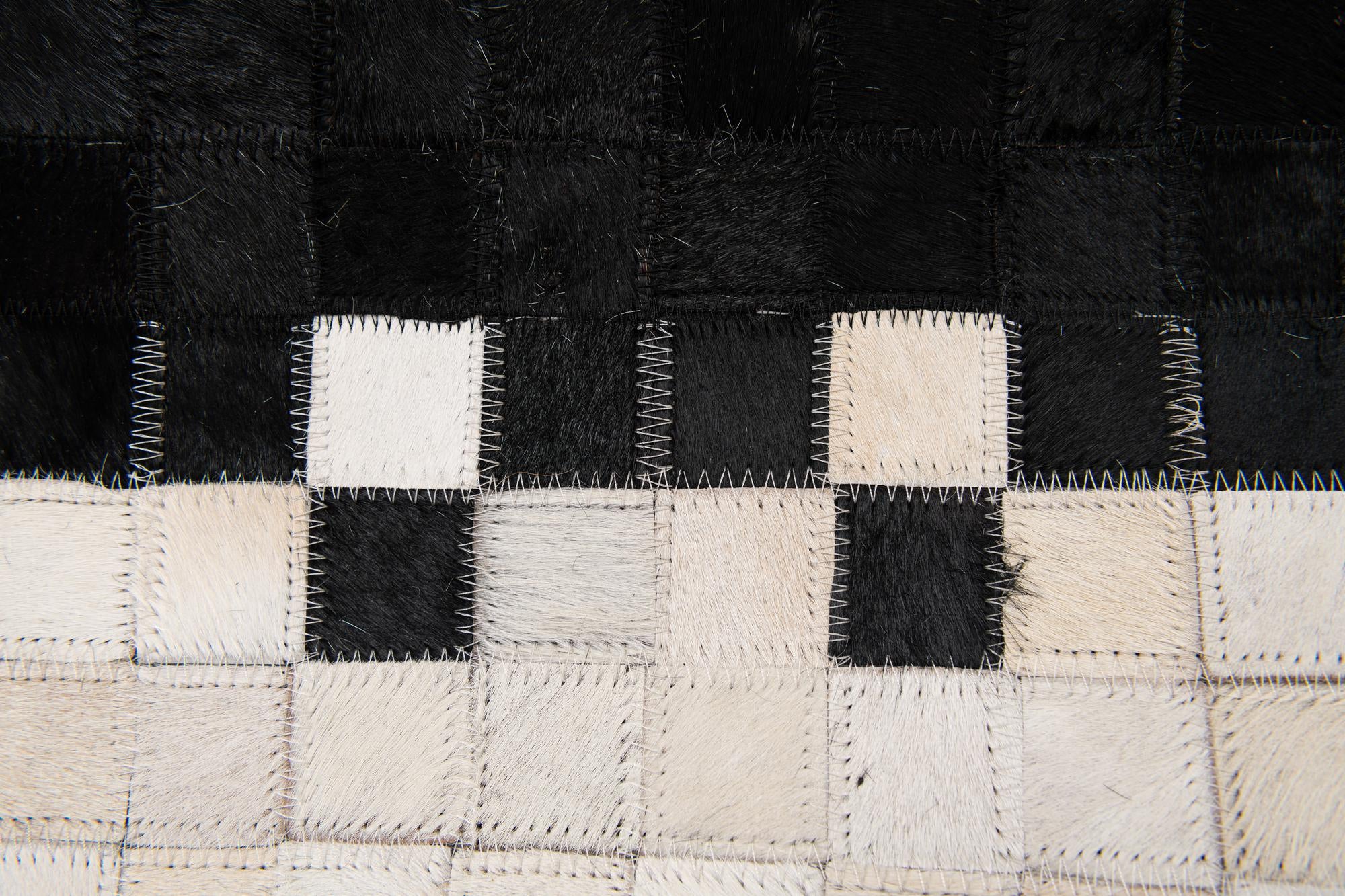 5' 2 x 8' 1 Cowhide Stocks Rug