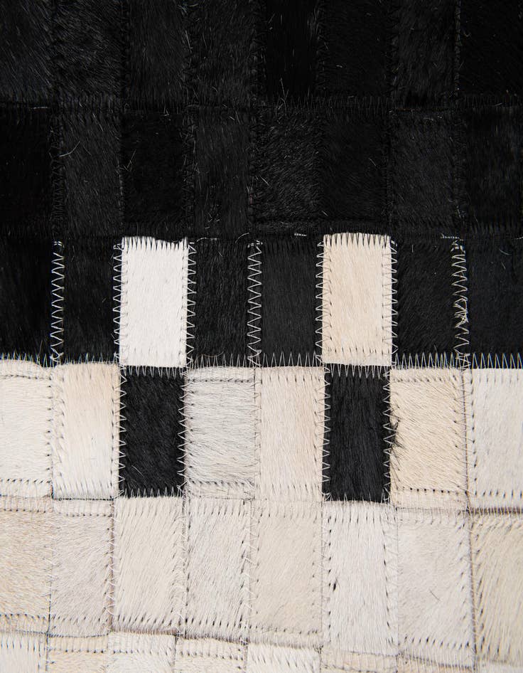 Detail image of 5' 2 x 8' 1 Cowhide Stocks Rug