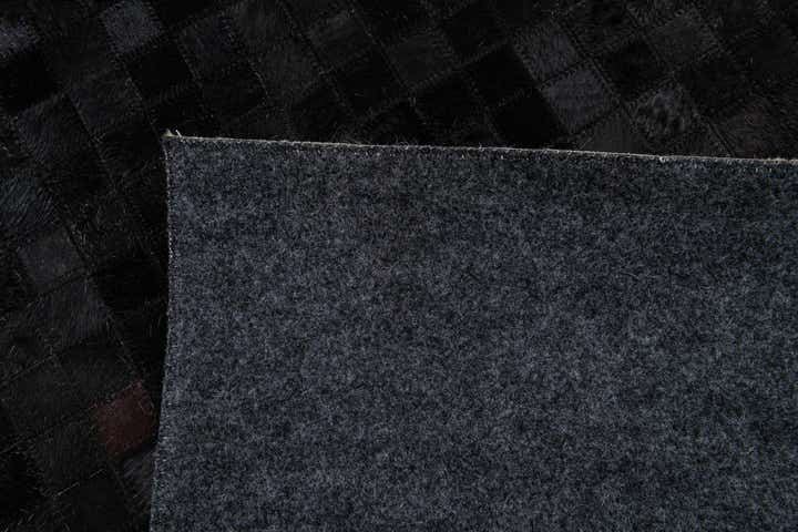 5' 2 x 8' 1 Cowhide Stocks Rug