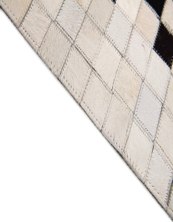 Detail image of 4' 11 x 7' 11 Cowhide Stocks Rug