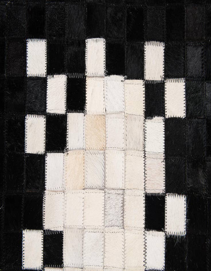 Detail image of 4' 11 x 7' 11 Cowhide Stocks Rug
