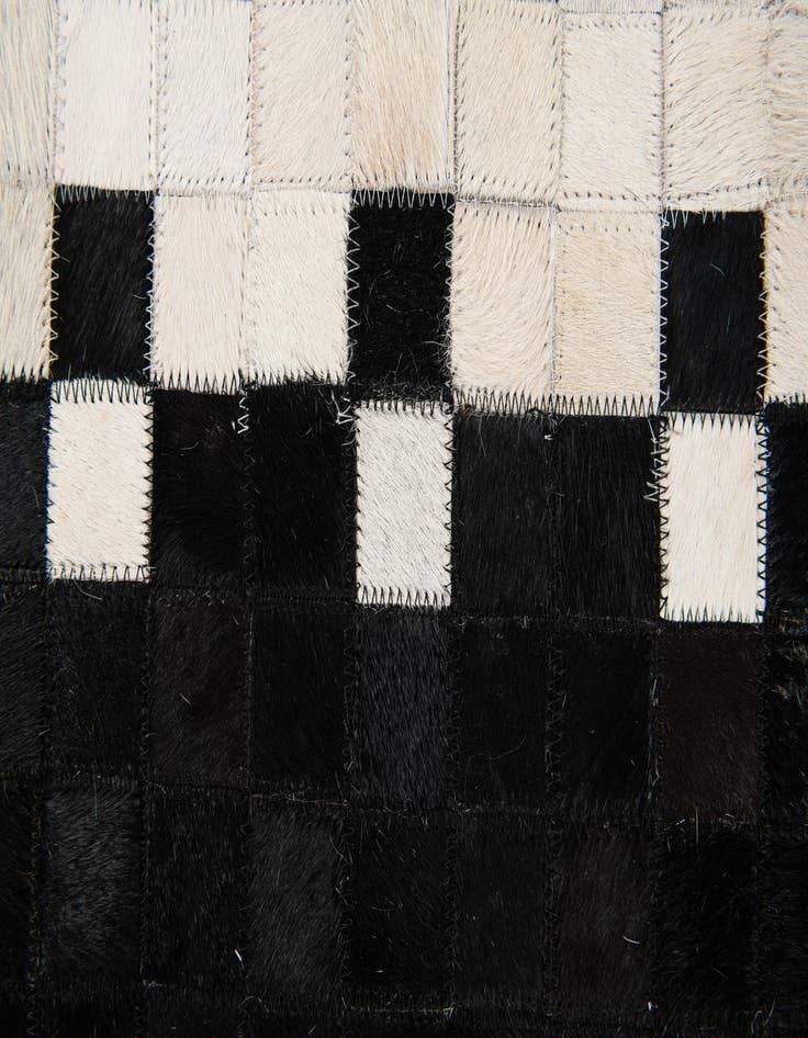 Detail image of 4' 11 x 7' 11 Cowhide Stocks Rug