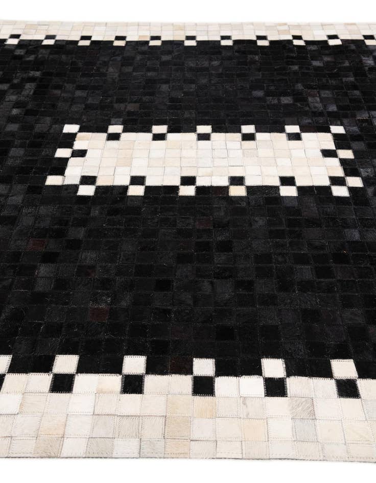 Detail image of 5' 2 x 8' 1 Cowhide Stocks Rug