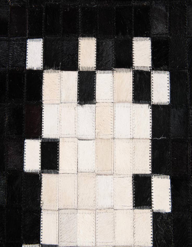 Detail image of 5' 2 x 8' 1 Cowhide Stocks Rug