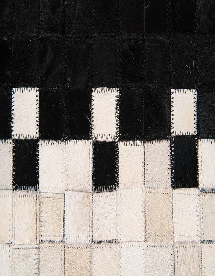 Detail image of 5' 2 x 8' 1 Cowhide Stocks Rug