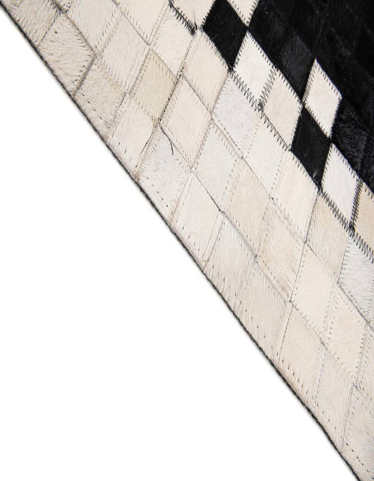 Detail image of 5' 1 x 7' 11 Cowhide Stocks Rug