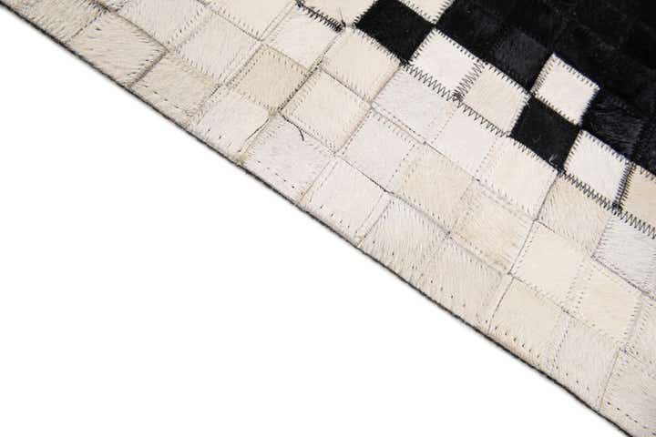 5' 1 x 7' 11 Cowhide Stocks Rug