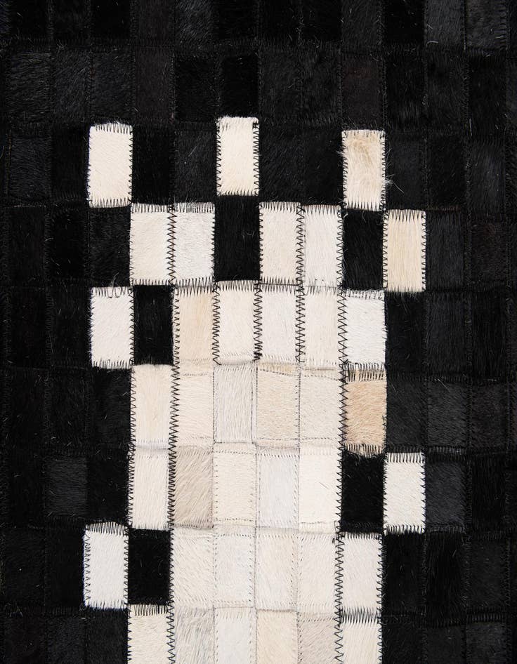 Detail image of 5' 1 x 7' 11 Cowhide Stocks Rug