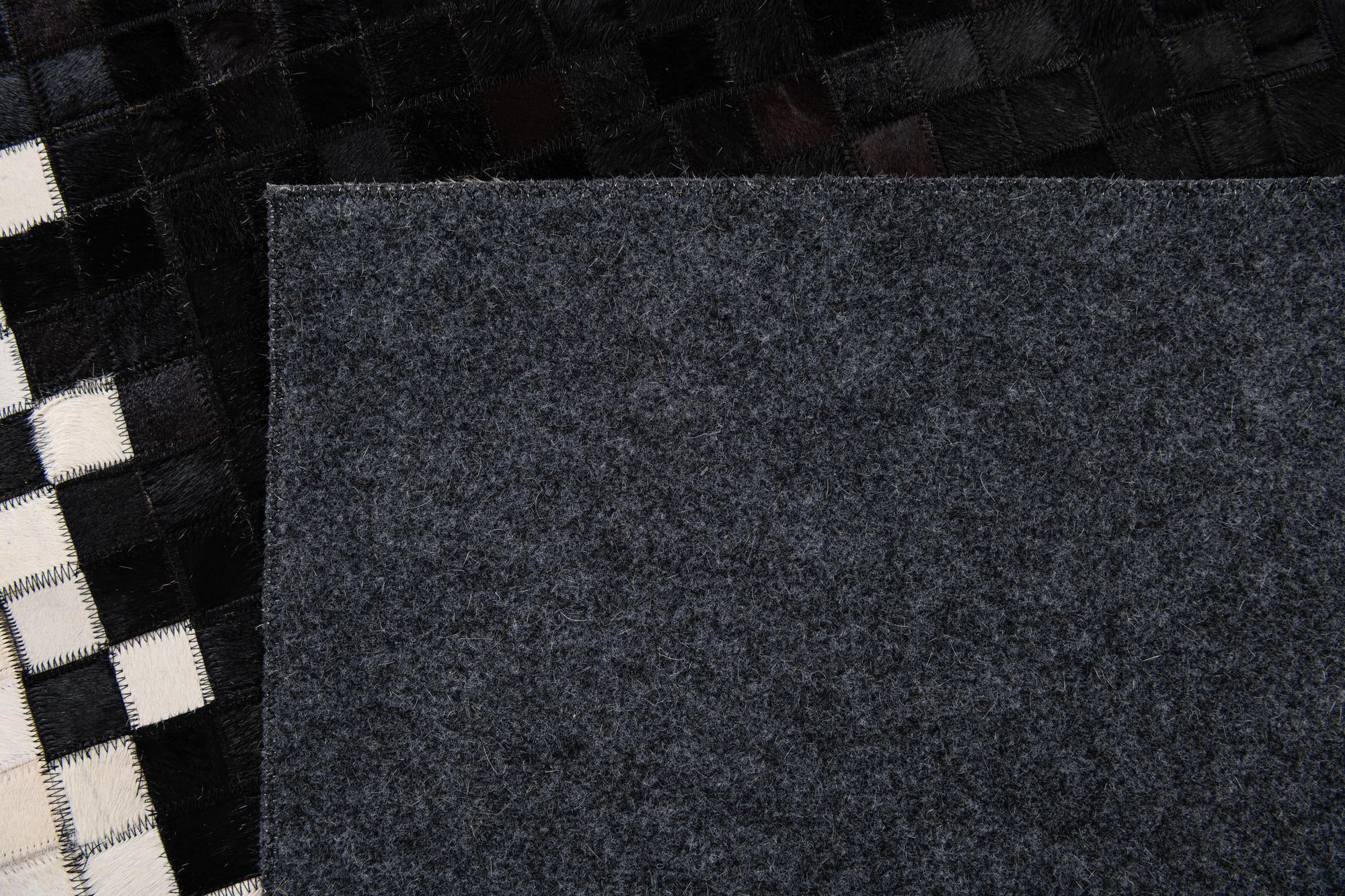 5' 1 x 7' 11 Cowhide Stocks Rug