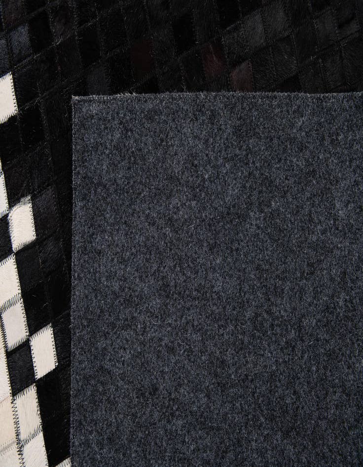 Detail image of 5' 1 x 7' 11 Cowhide Stocks Rug