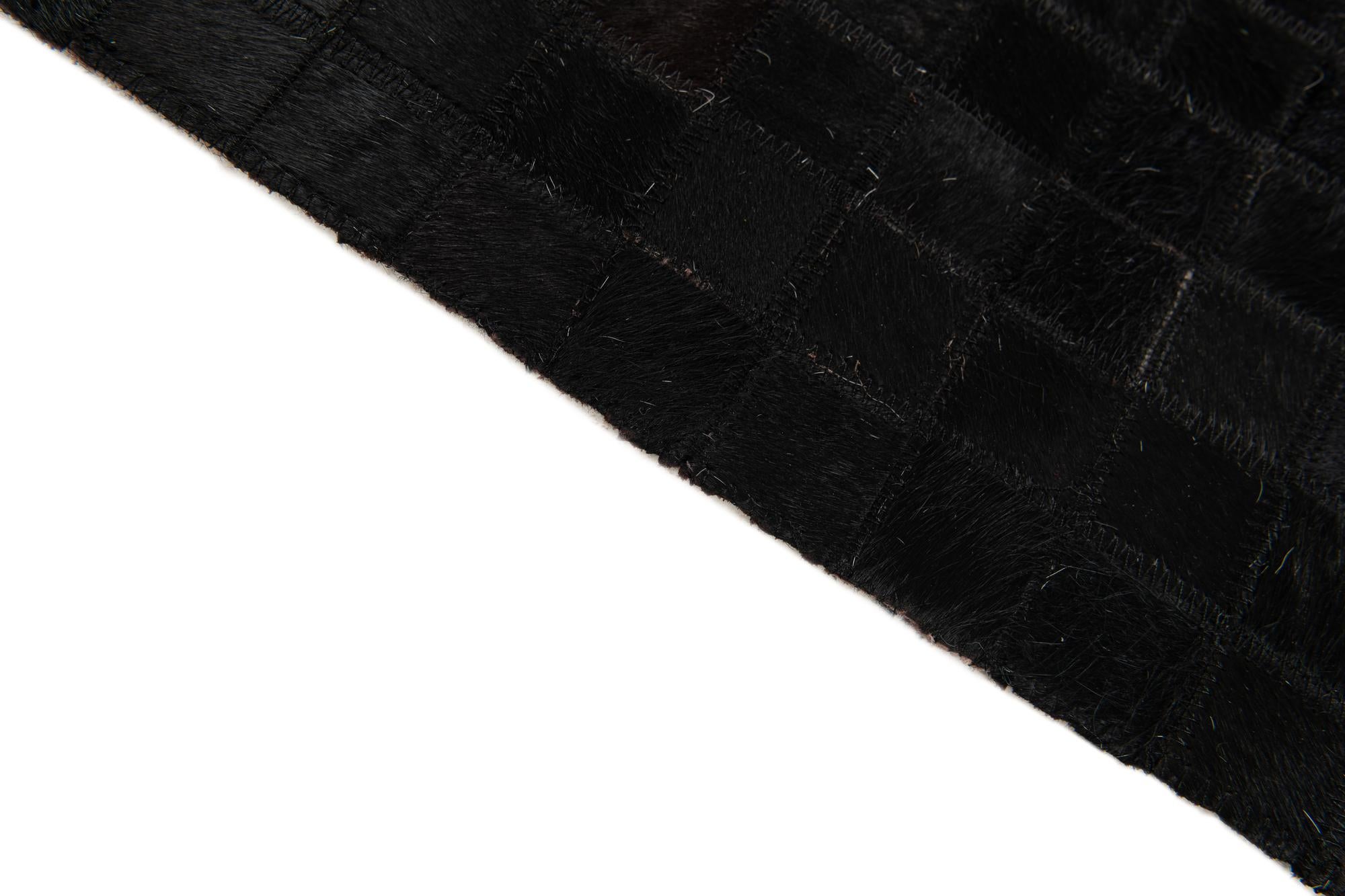 5' x 8' Cowhide Stocks Rug