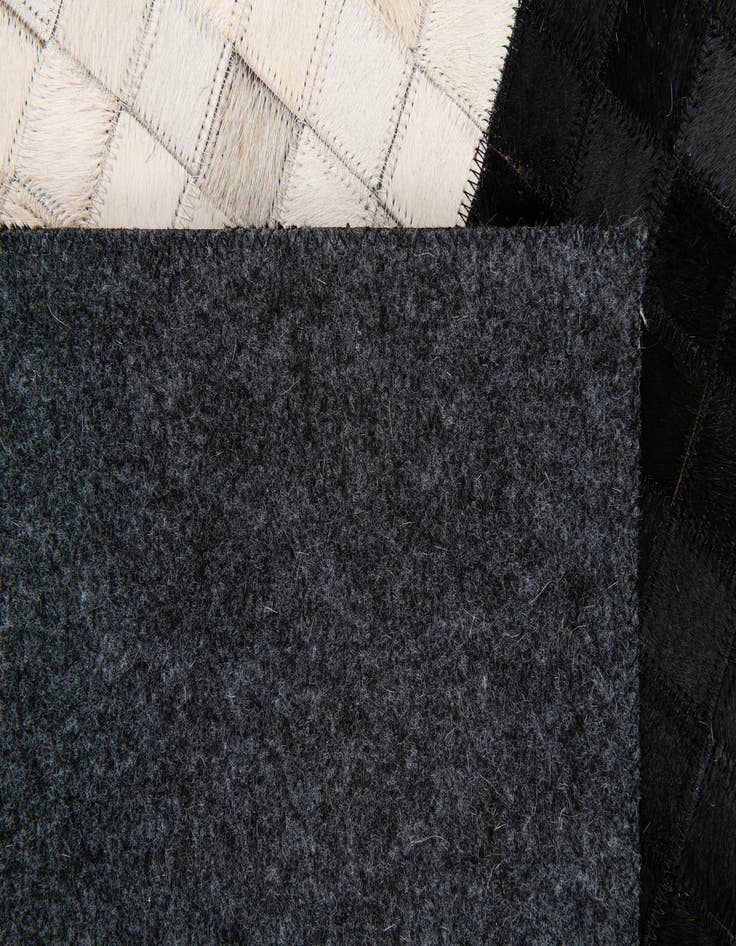 Detail image of 5' x 8' Cowhide Stocks Rug