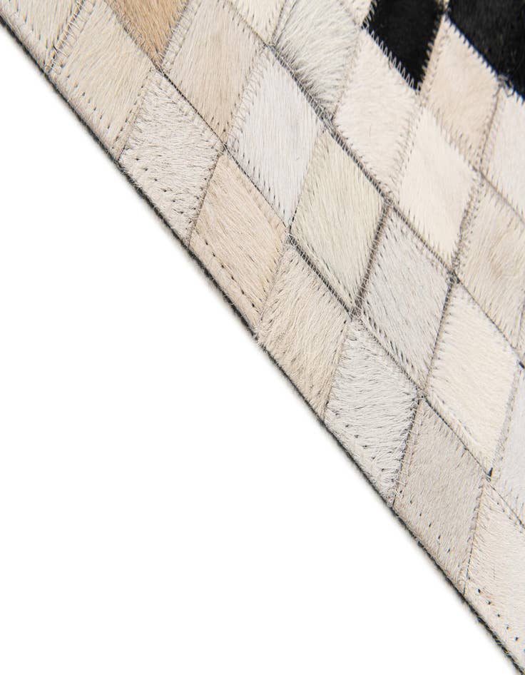 Detail image of 5' 1 x 7' 11 Cowhide Stocks Rug