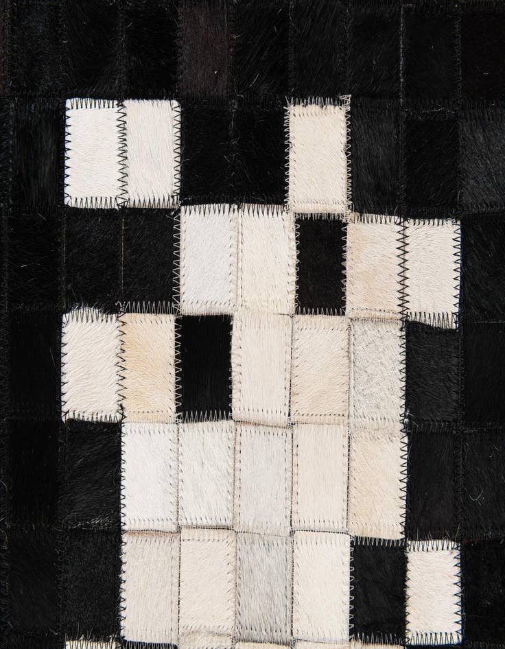 Detail image of 5' 1 x 7' 11 Cowhide Stocks Rug