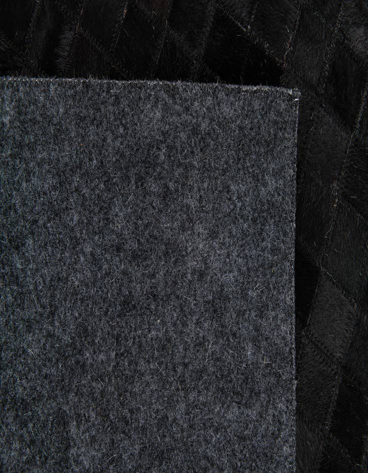 Detail image of 5' 1 x 7' 11 Cowhide Stocks Rug