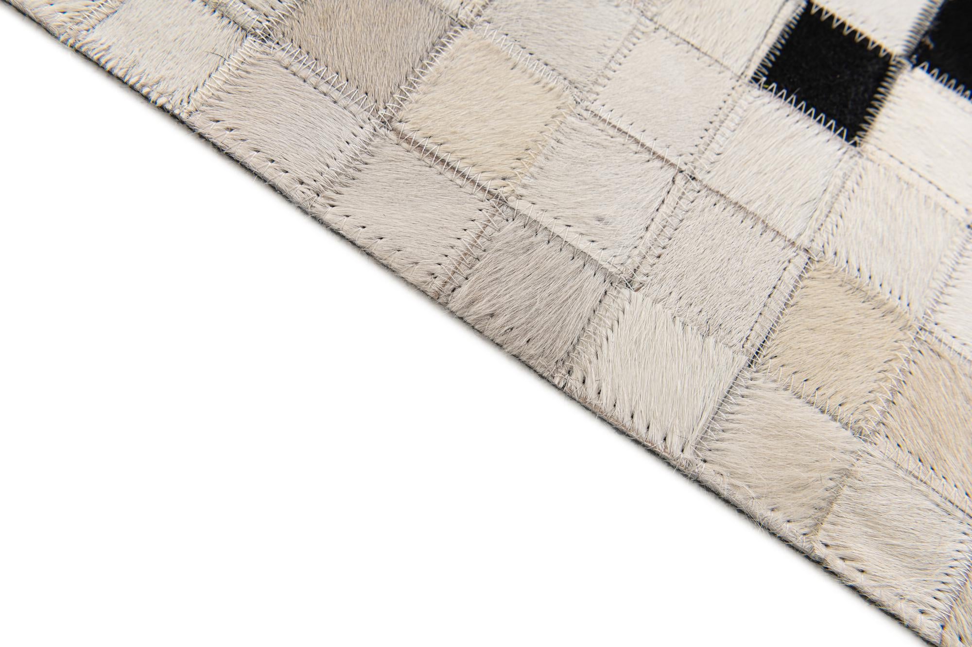 5' 2 x 7' 11 Cowhide Stocks Rug