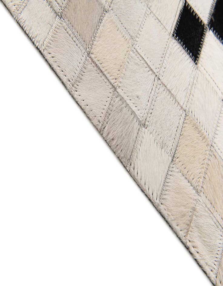 Detail image of 5' 2 x 7' 11 Cowhide Stocks Rug