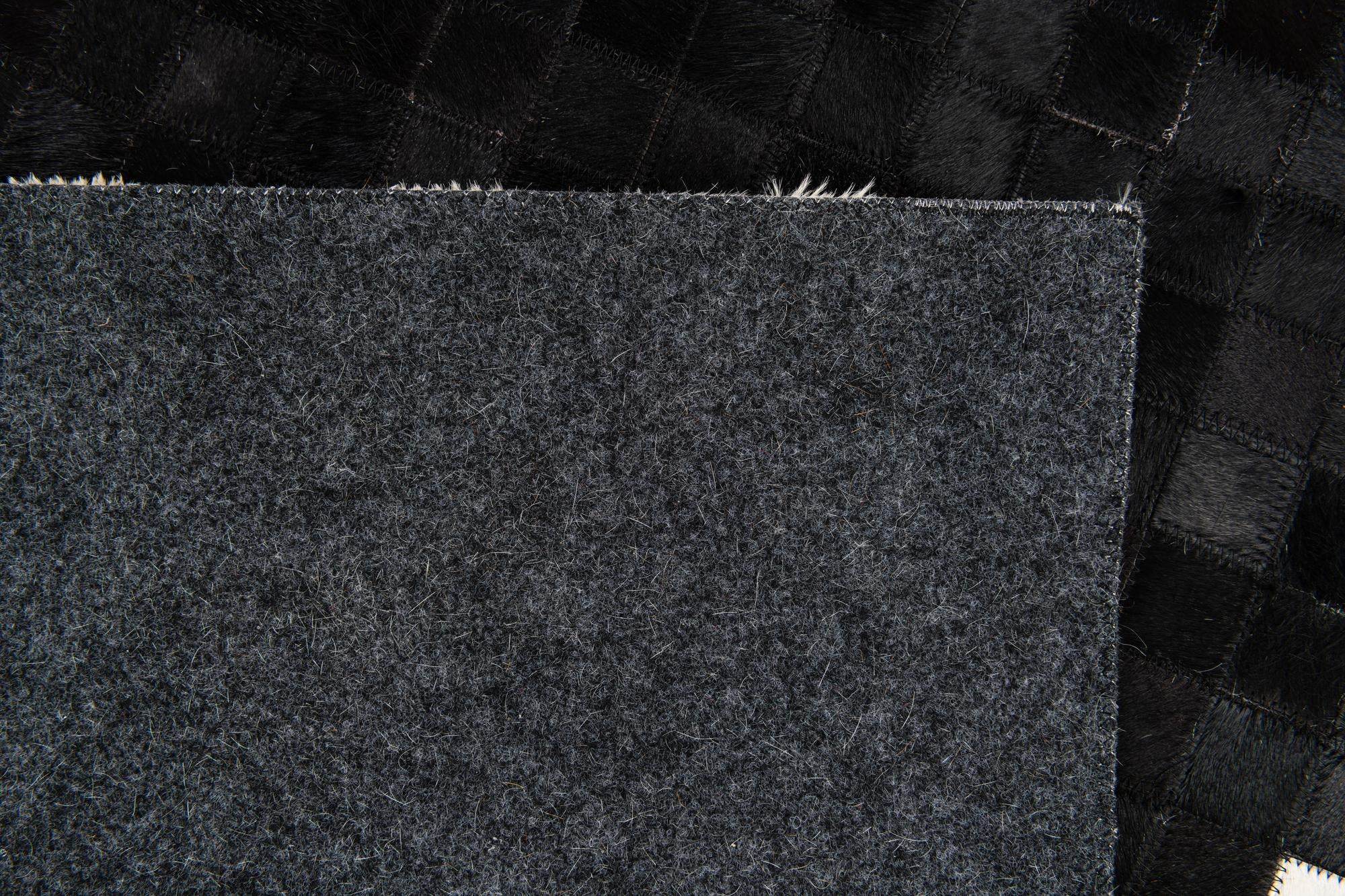 5' 2 x 7' 11 Cowhide Stocks Rug