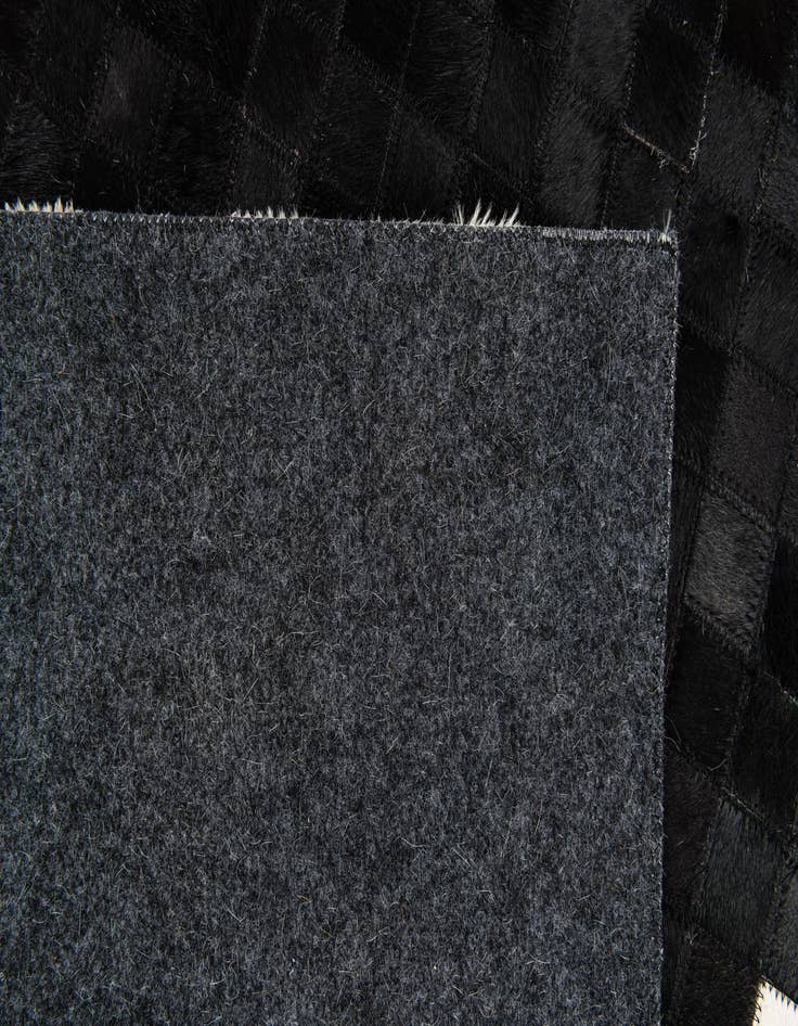 Detail image of 5' 2 x 7' 11 Cowhide Stocks Rug