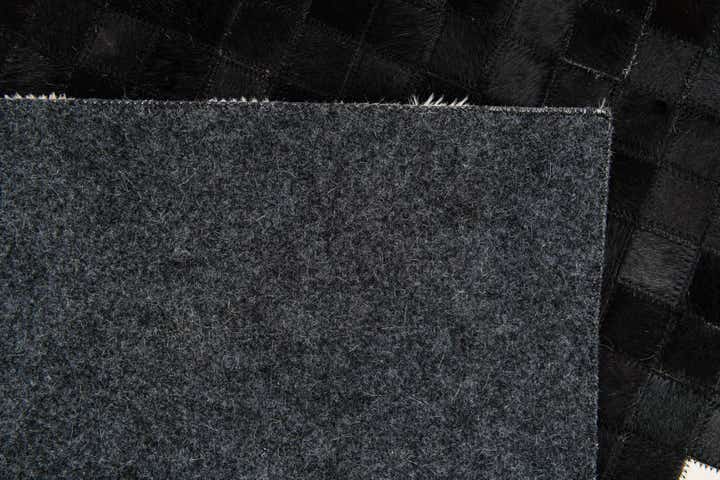 5' 2 x 7' 11 Cowhide Stocks Rug