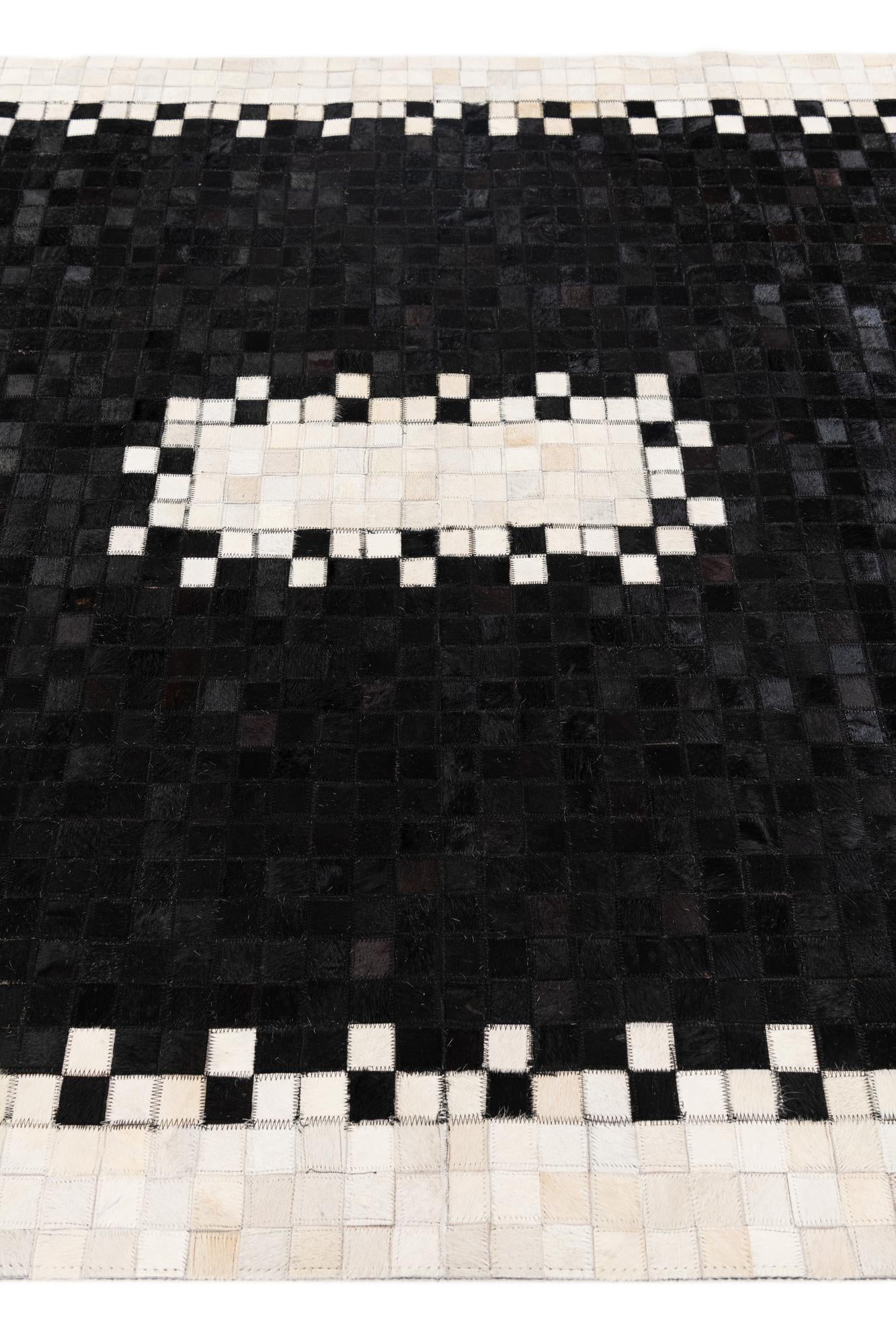 5' 1 x 7' 10 Cowhide Stocks Rug