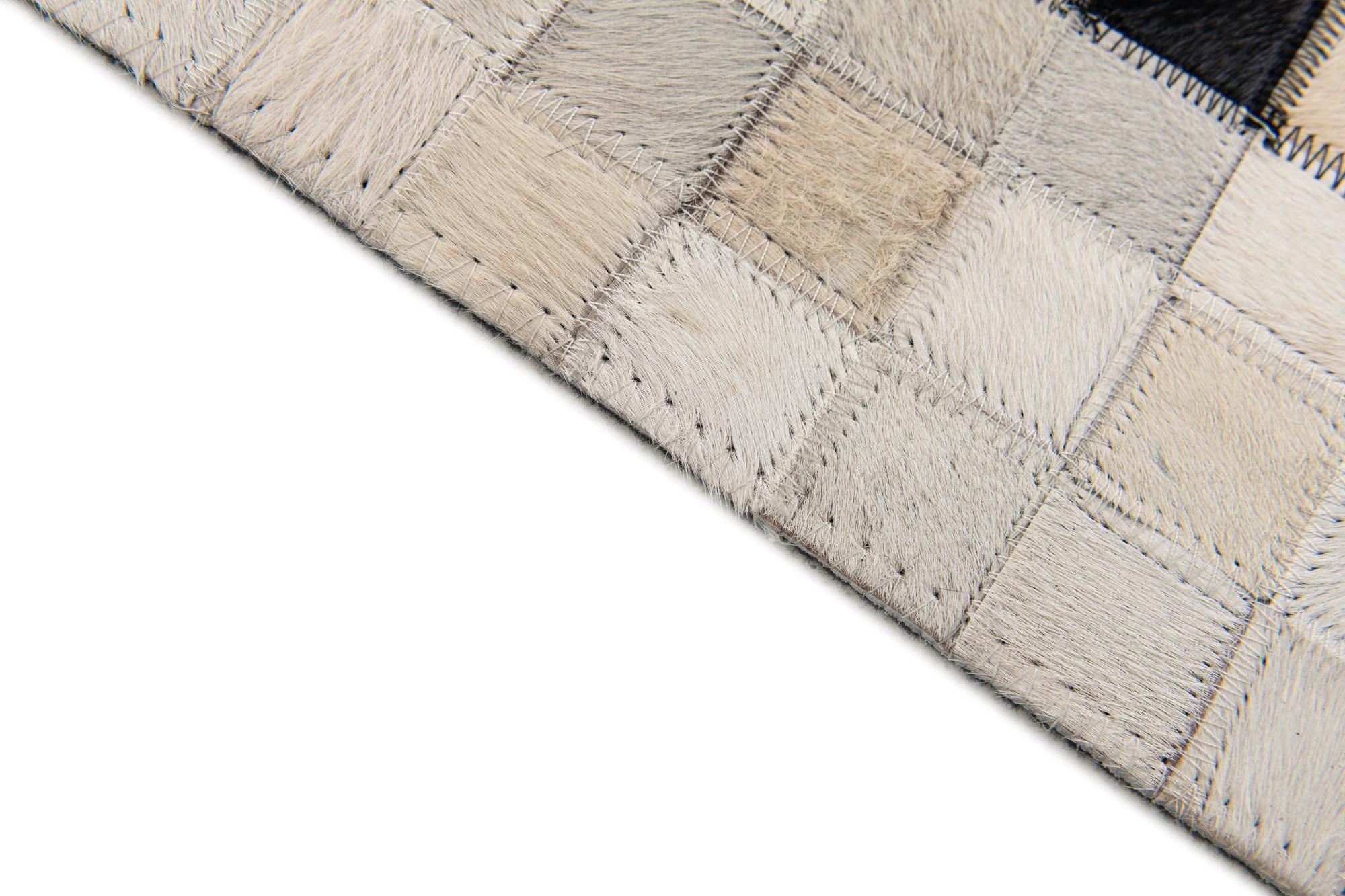 5' 1 x 7' 10 Cowhide Stocks Rug